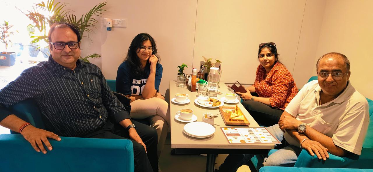 Guests sharing a table at Cafe Central Jaipur